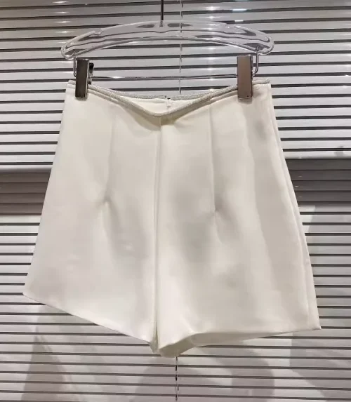 Minifalda con diamantes de imitación para mujer, pantalones cortos informales con dobladillo, diseño de temperamento social, Bootcut, otoño e