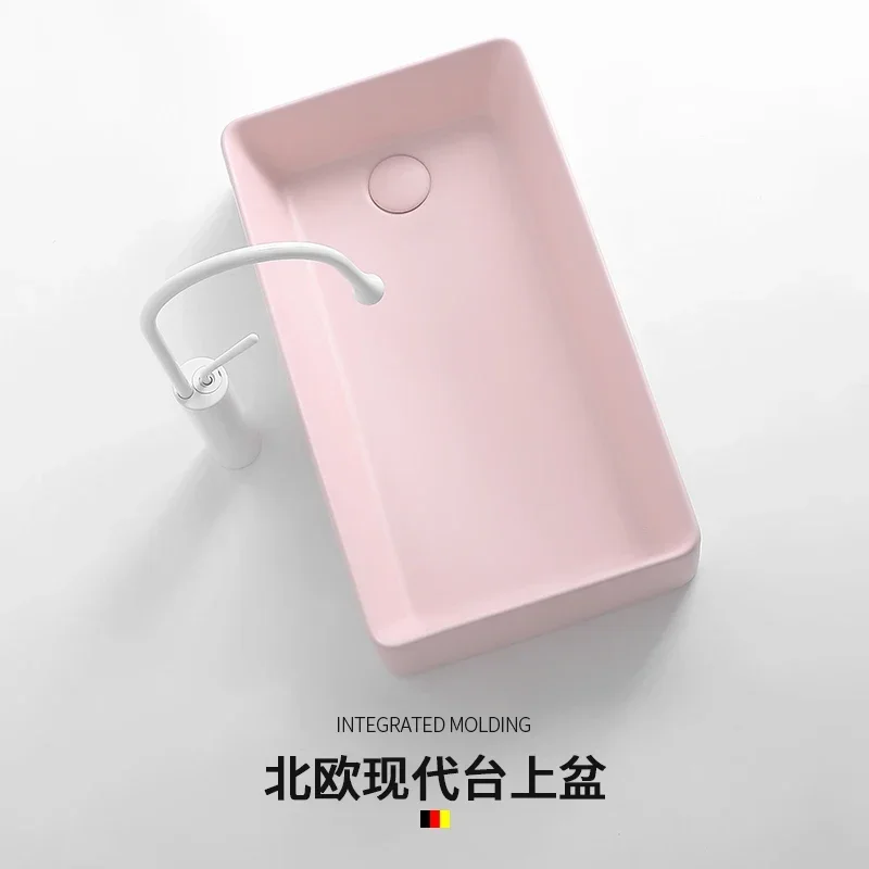 A  Milk powder color ceramic washing machine, basin side drainage wash basin, household left and right side launching balcony