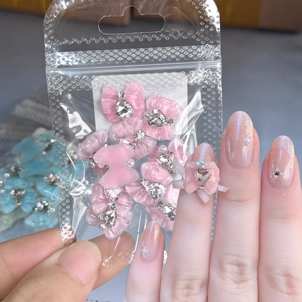 

10PCS 3D Pink Bowknot Nail Charms Resin Bow with Crystal Heart Rhinestone Pearl Nail Accessories 14*13mm Ribbon Bowtie Nail Deco