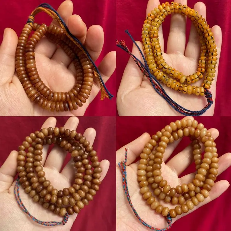 -style prayer made from camel and yak bone featuring traditional Tibetan medicinal tablets 108 beads