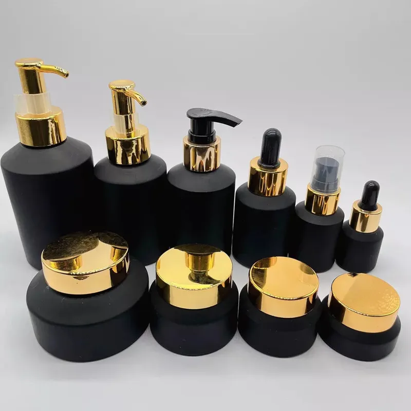 Cosmetic packaging 15ml-100g matte black slant shoulder glass bottle with gold lid/pump/dropper lotion bottle cream jar sets