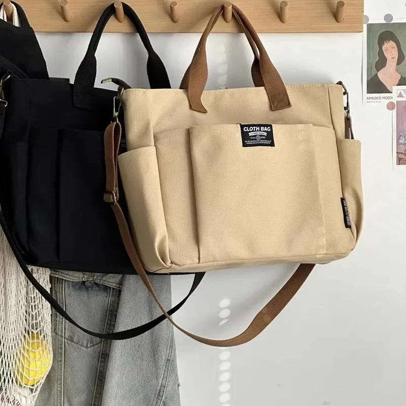 

Urban Minimalist Female Student Large Capacity Commuting Horizontal Canvas Single Shoulder Diagonal Cross Portable Tote Bag