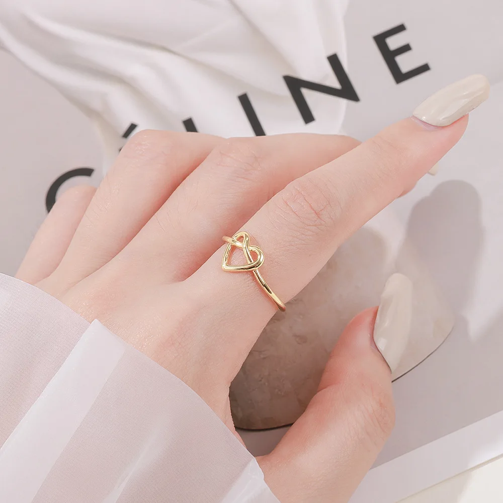 Korean Version Of The Simple Hollow Hollow Love Heart Opening Adjustable Ring Infinite Peach Tail Hand Jewelry