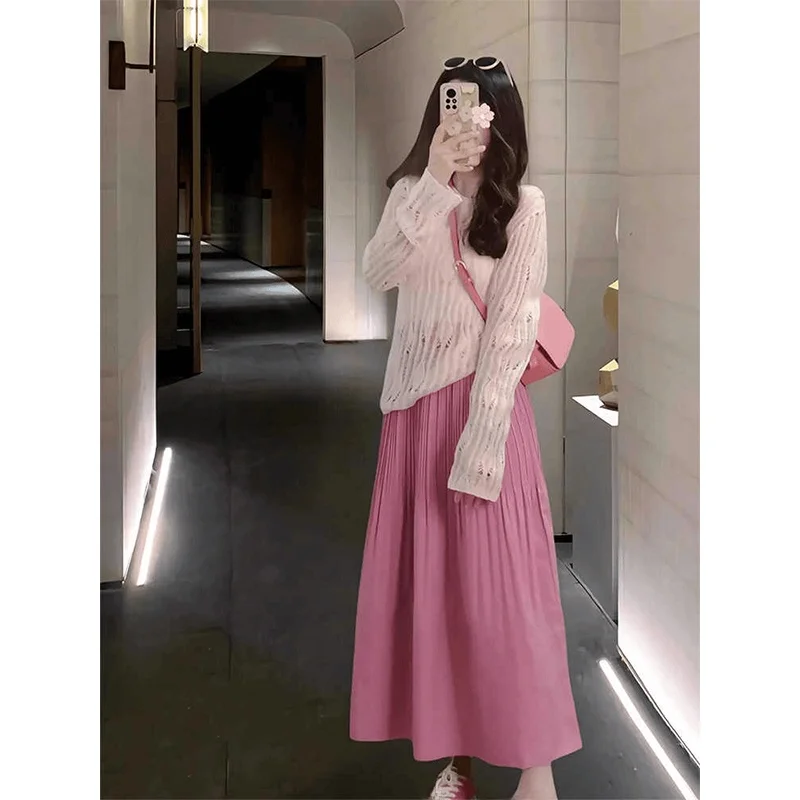 Top ampio scavato lavorato a maglia Faion all'inizio della primavera con gonna dimagrante Set da due pezzi Ensemble di abbigliamento alla moda da donna