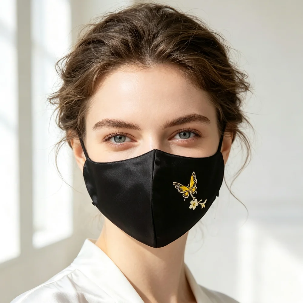 masque-en-soie-noire-avec-broderie-de-fleurs-et-de-papillons-–-soie-de-murier-pure-faite-a-la-main-un-accessoire-sophistique-pour-un-usage-quotidien