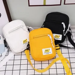 Bolso cruzado de lona 2024 para mujer, bolso de hombro pequeño de tendencia, bolso para teléfono de estudiante de Color sólido coreano, bolso de compras Simple con cremallera