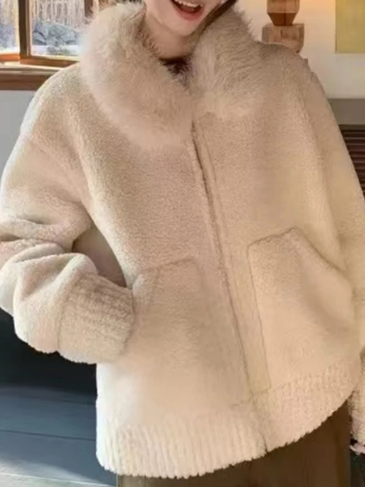 Elegancki długi płaszcz z futrzanym kołnierzem, damski, jesienno-zimowy, luźny krój, wyszczuplający top, koreański styl, skóra i futro.