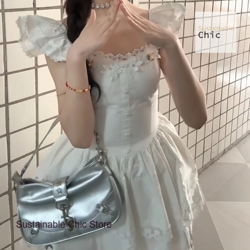 

Summer white dress female applique lace stitching French fashion sweet waist slim spice girl small flying sleeve dress.