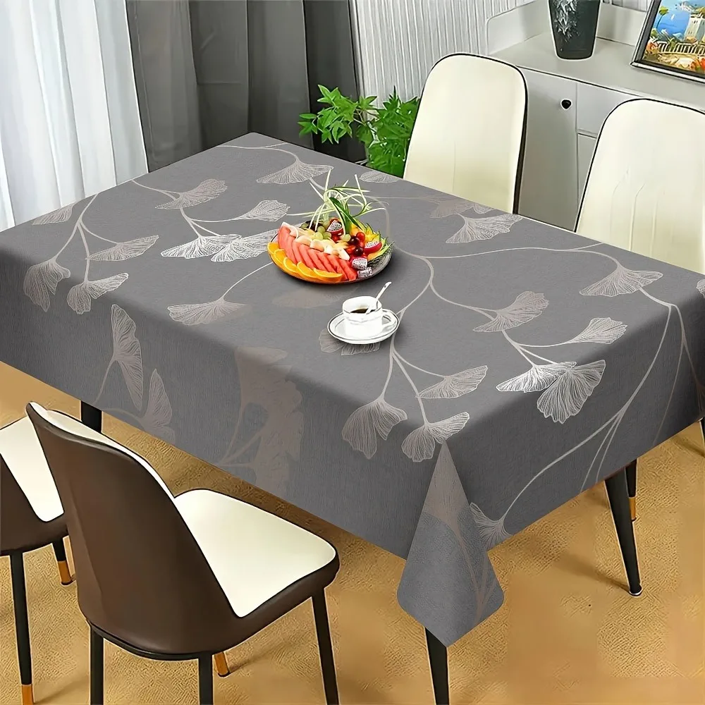 One polyester fabric tablecloth with a grey ginkgo leaf pattern, elegant and easy to clean.