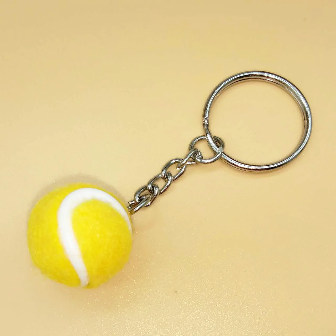 LLavero de tenis de 2cm, colgante de pedales, pendientes deportivos, accesorios de pelota de juguete, depósito primero para obtener un gran descuento, Pta356, 100 piezas