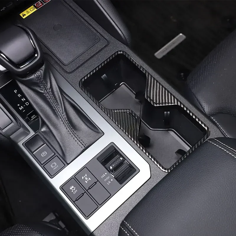 

For Toyota Land Cruiser Prado 2024 ABS carbon fiber car central control water cup frame cover sticker car interior accessories