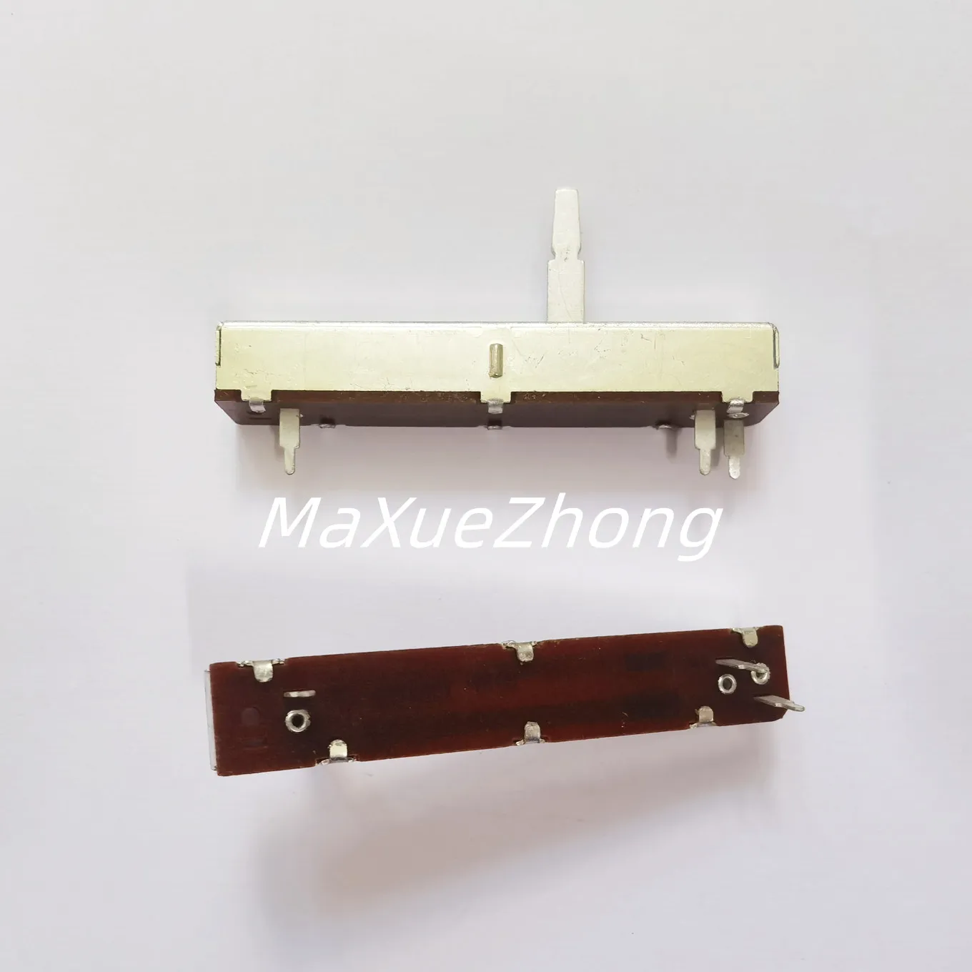 

Original new 100% straight slide potentiometer 100K total length 70mm stroke 50mm with midpoint handle length 20mm SWITCH