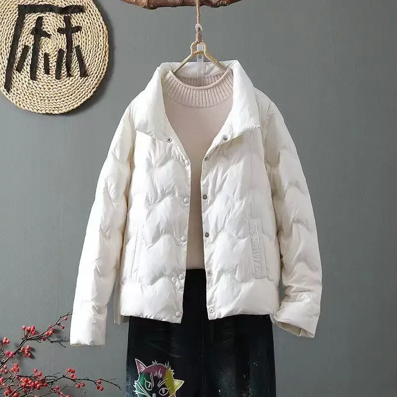 Janveny 2024 nuovo autunno inverno colletto alla coreana leggero piumino adesivo pressato donna calore sciolto piumino d'anatra cappotto corto