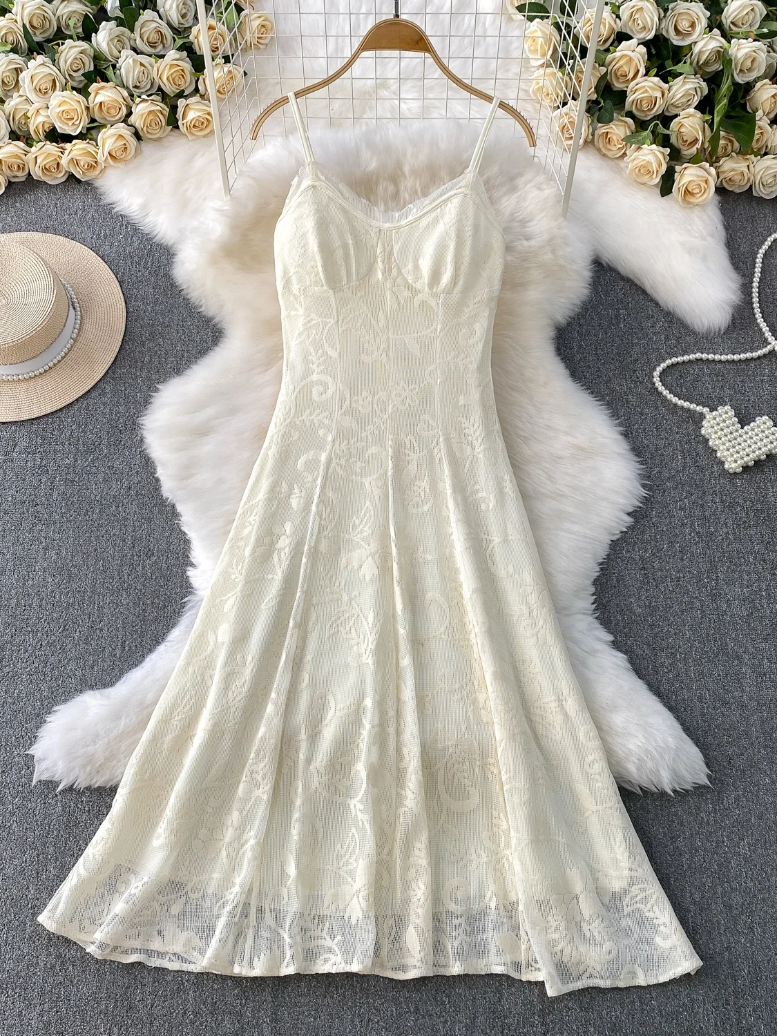 تنورة نسائية صيفية مفرغة من Ele مطرزة بخصر عالٍ للتخسيس طويلة مع وسادة صدر تنورة كورية على شكل حرف a