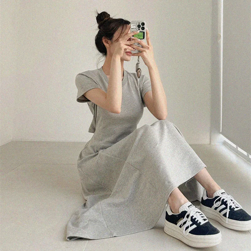 Été nouveau Sle ort Sve Bal tricoté T-shirt Dr femmes sur le genou longue a-ligne minceur Ele jupe à la mode