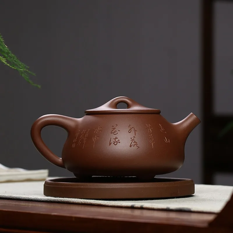Large-capacity purple clay pot, all handmade genuine tea set, bottom slot clear teapot, sand in the rain