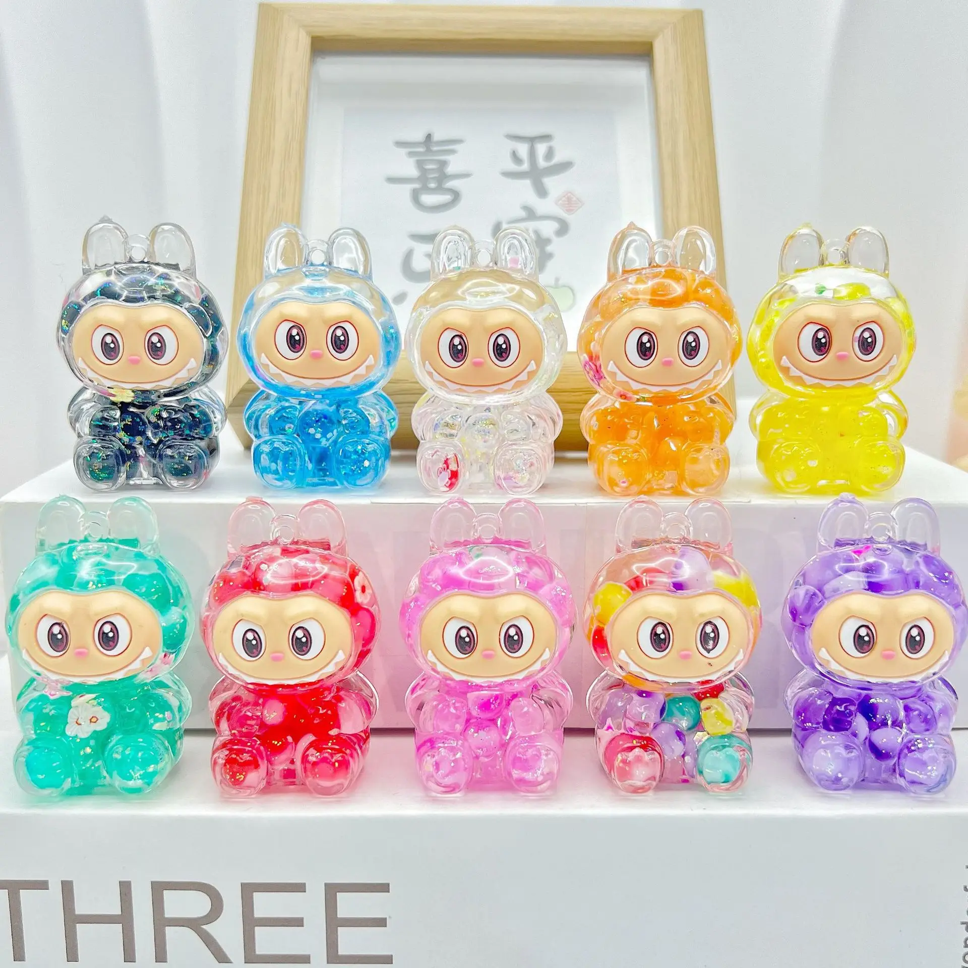 Labubu sleutelhanger acryl leuke cartoon creatieve drijfzand ornamenten kawaii bubble kraal zandfles sleutelhangers hanger feestgeschenken