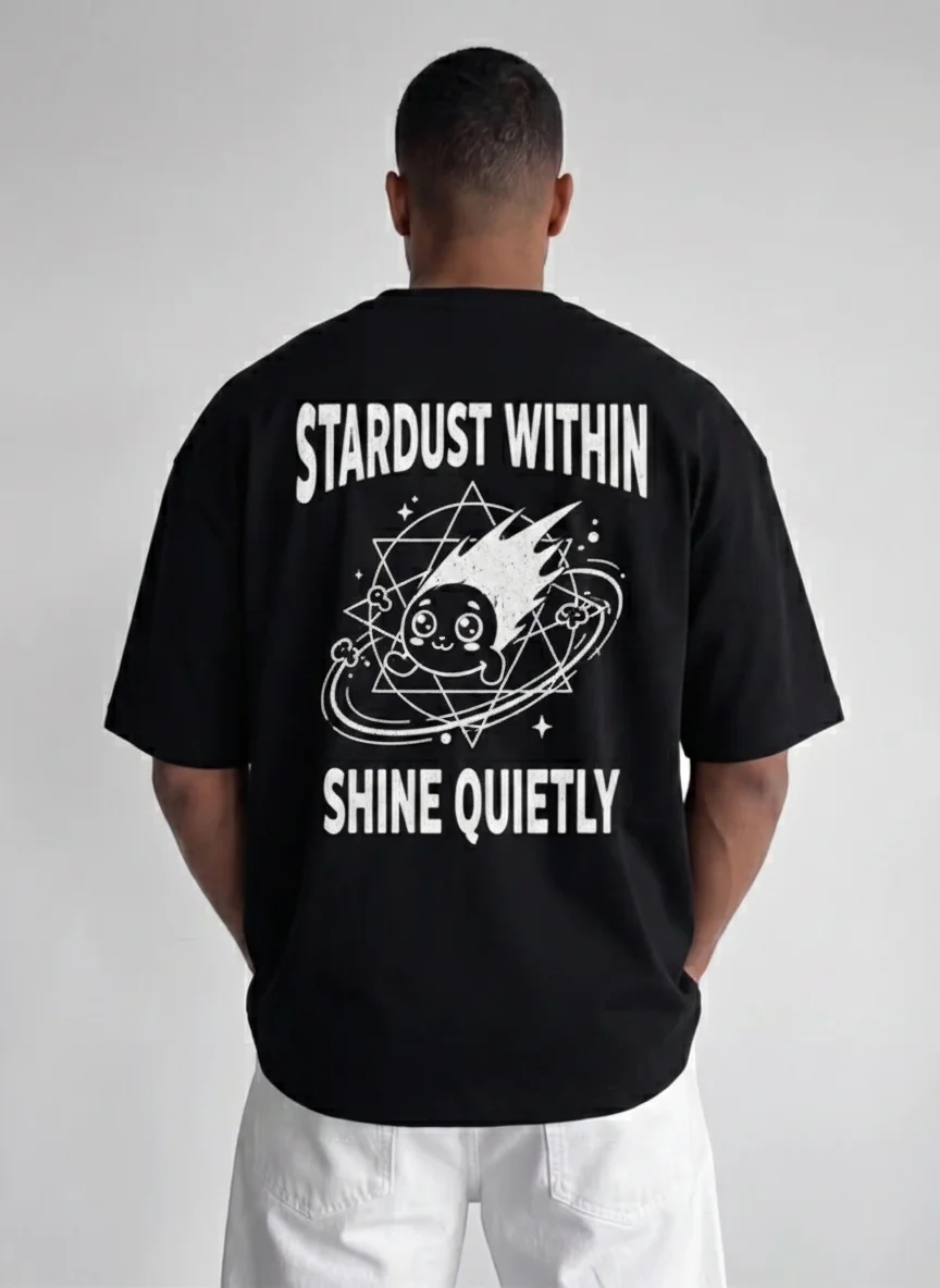 

Black Graphic Tee with White Kawaii Shooting Star Meteor Print Stardust Within Shine Quietly Celestial Cartoon Illustration