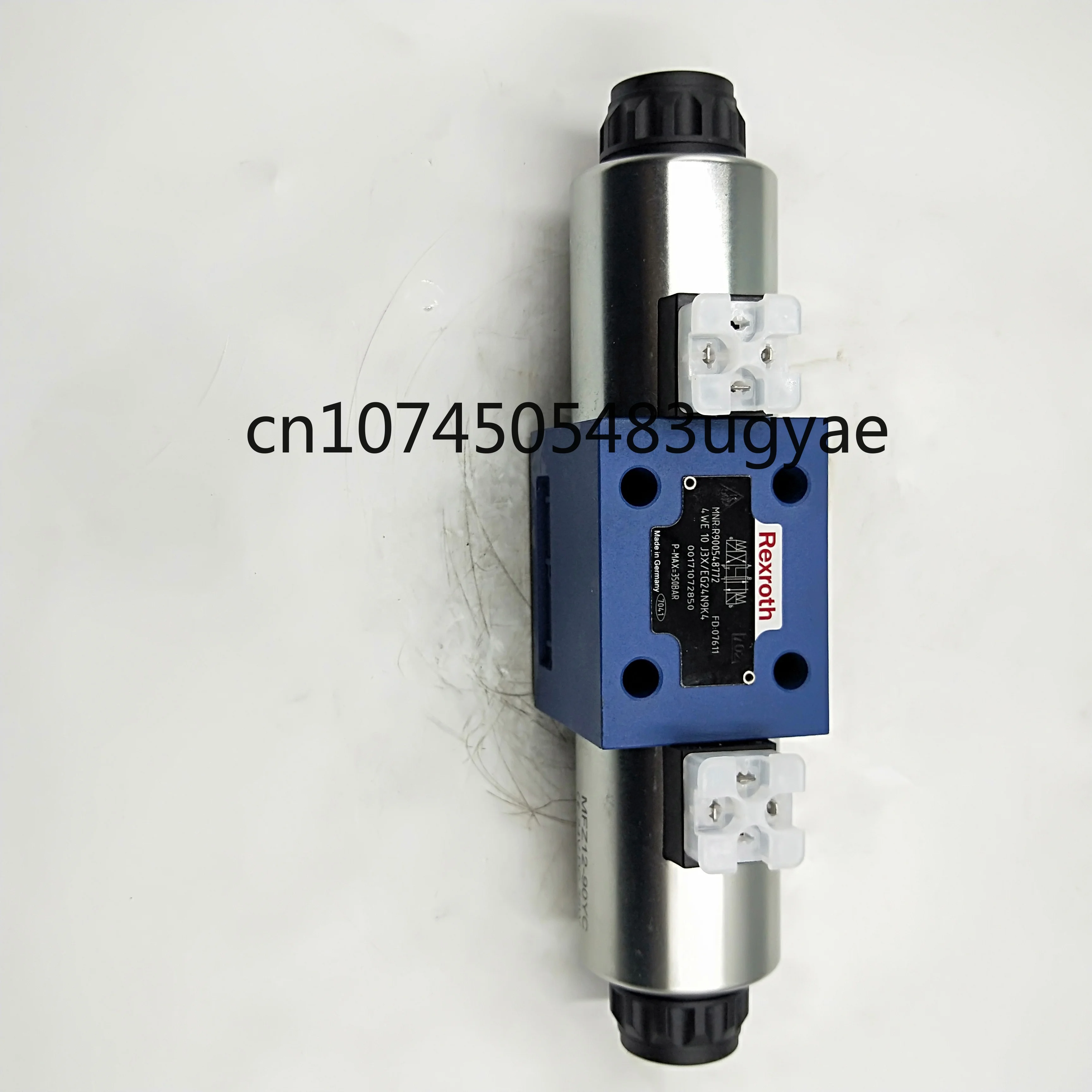 We10d3x/Cg24n9k4/B20 We10d30 Hydraulic Solenoid Valve 4we10j73-3x/Cg24n9k4 4we10w-l3x/Cg224nz5l