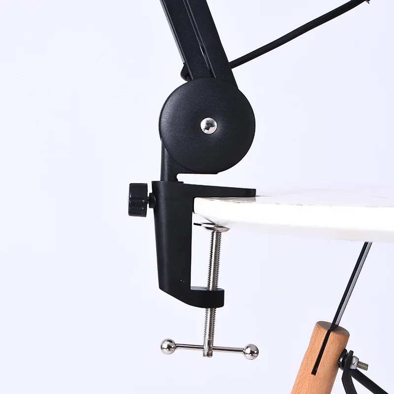 

Magnifying glass desk lamp folding bracket