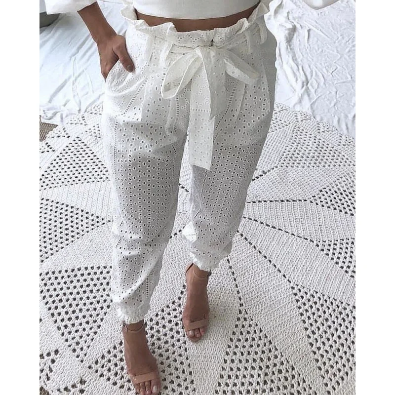 2023Amazon AliExpress Hot Sale Cross-border women's clothing Cotton Embroidery Hollow Hole Lotus Leaf Waist Skinny Trousers