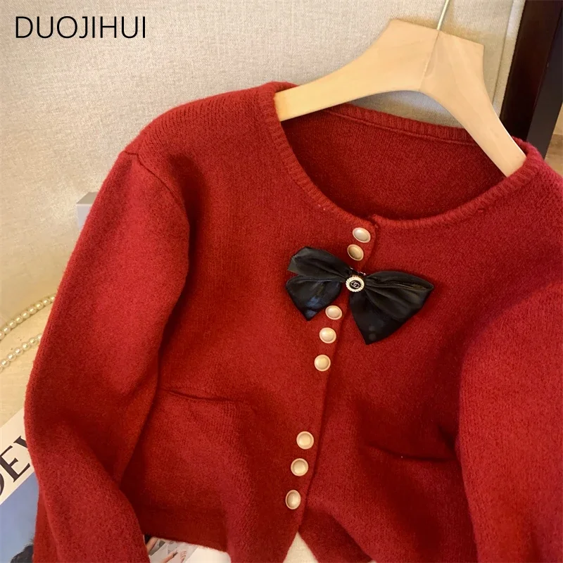 DUOJIHUI dolce Basic o-collo Chic Bow donna Cardigan autunno nuovo elegante semplice Casual tinta unita moda bottone Cardigan femminile