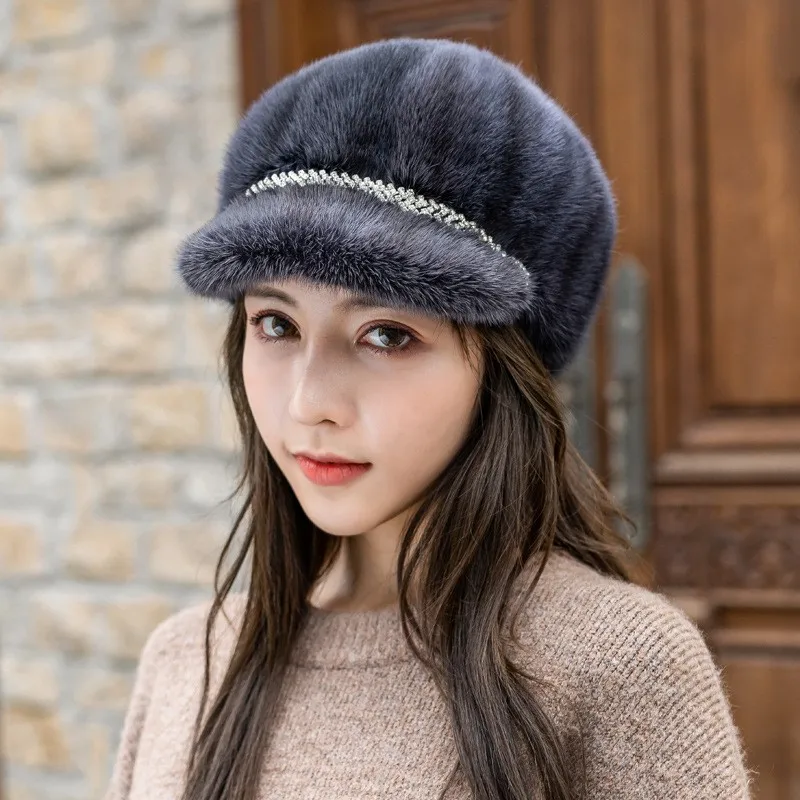 Leather hats are warm and fashionable for women in autumn winter They made of fur have a unique style Beret