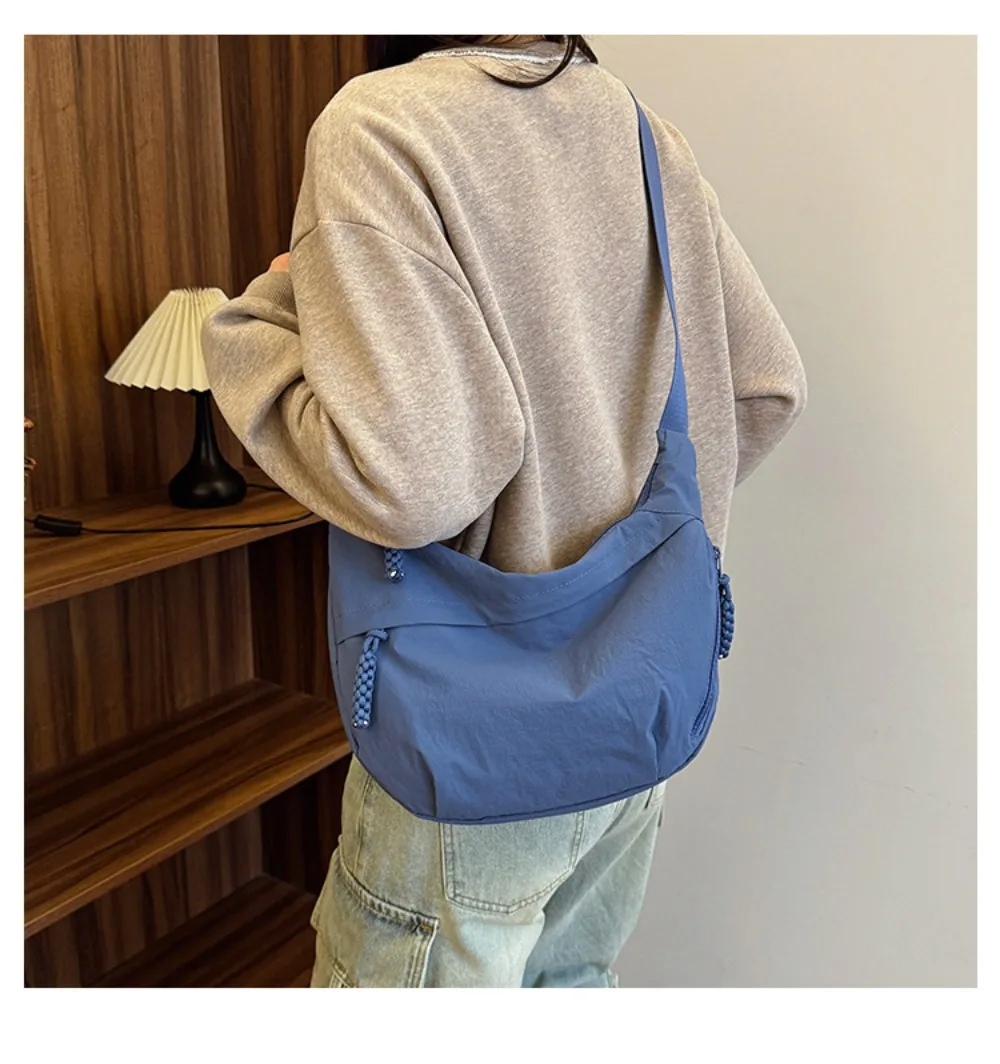 Neue Canvas-Umhängetaschen mit großer Kapazität, koreanische schlichte Sport-Hobos-Tasche, einfarbige leichte Dumpling-Tasche für Reisen – Detail 12