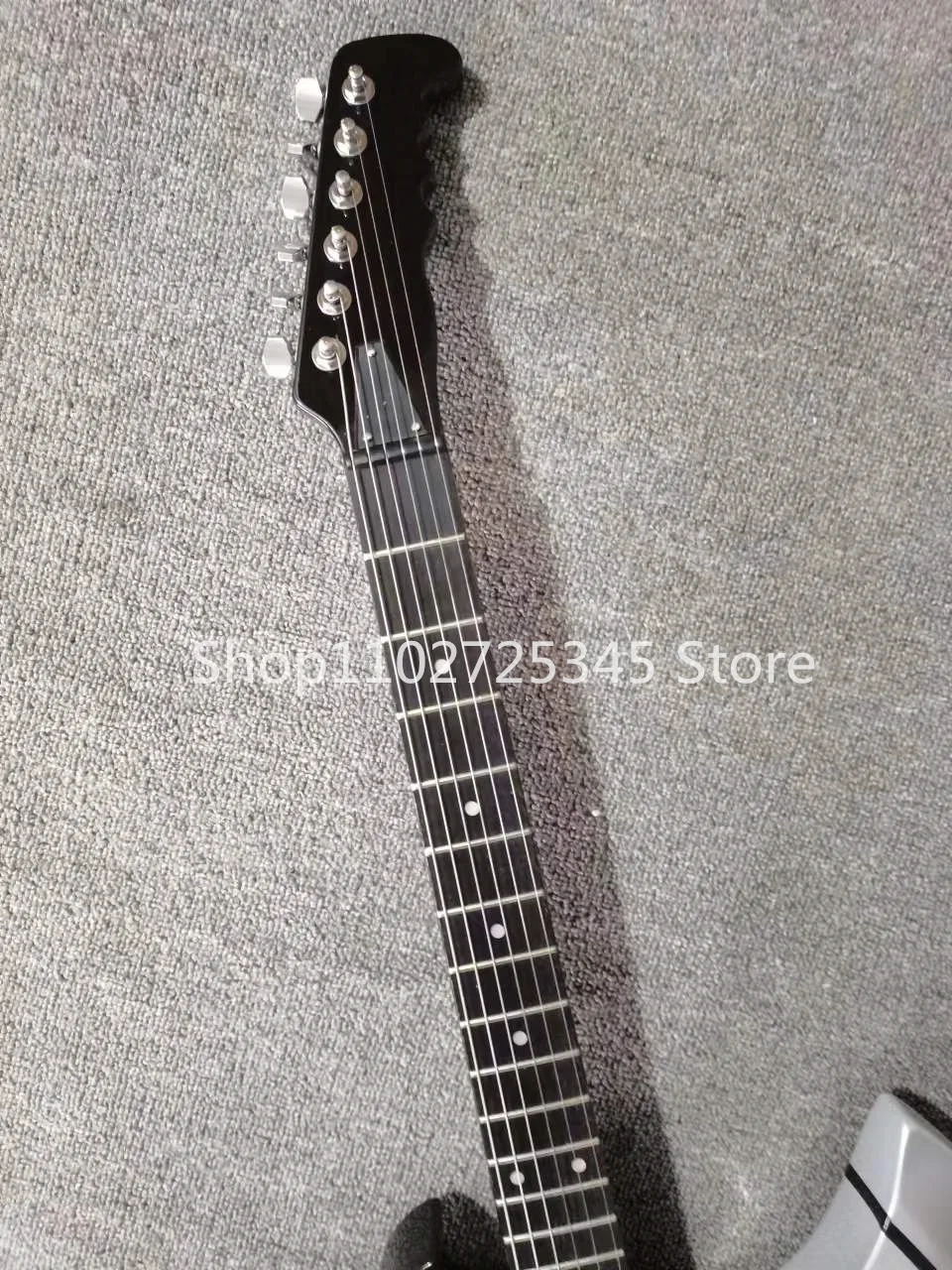 6-string axe electric guitar, rosewood fingerboard, silver accessories, seller to bear shipping costs