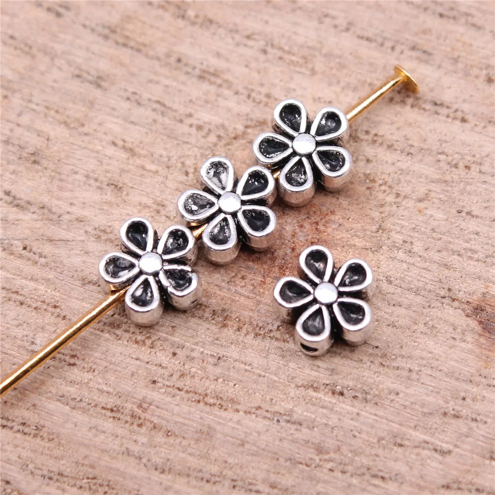 

40pcs 7*3mm Flower Small Hole Bead Finding