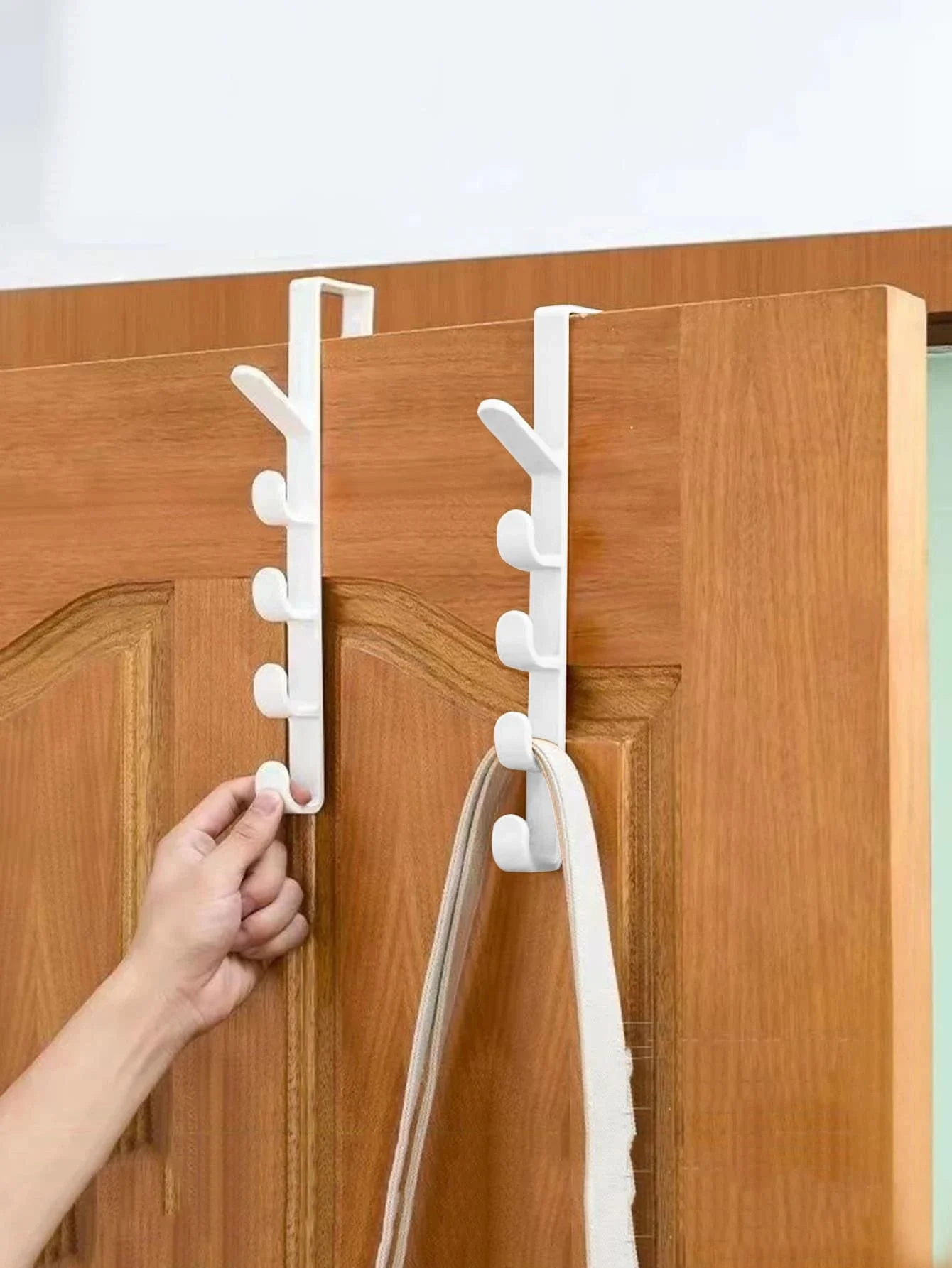 

Maximize Your Bedroom With This Over-The-Door Plastic Hanger Rack - Perfect For Clothes, Purses, And Bags