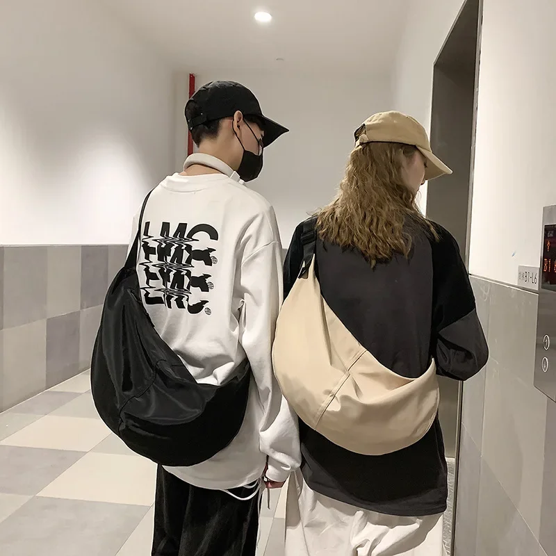 Bolso de un solo hombro para hombre y mujer, de gran capacidad nueva mochila, bolso de bola de masa hervida Simple, tendencia de moda, bolso de mensajero