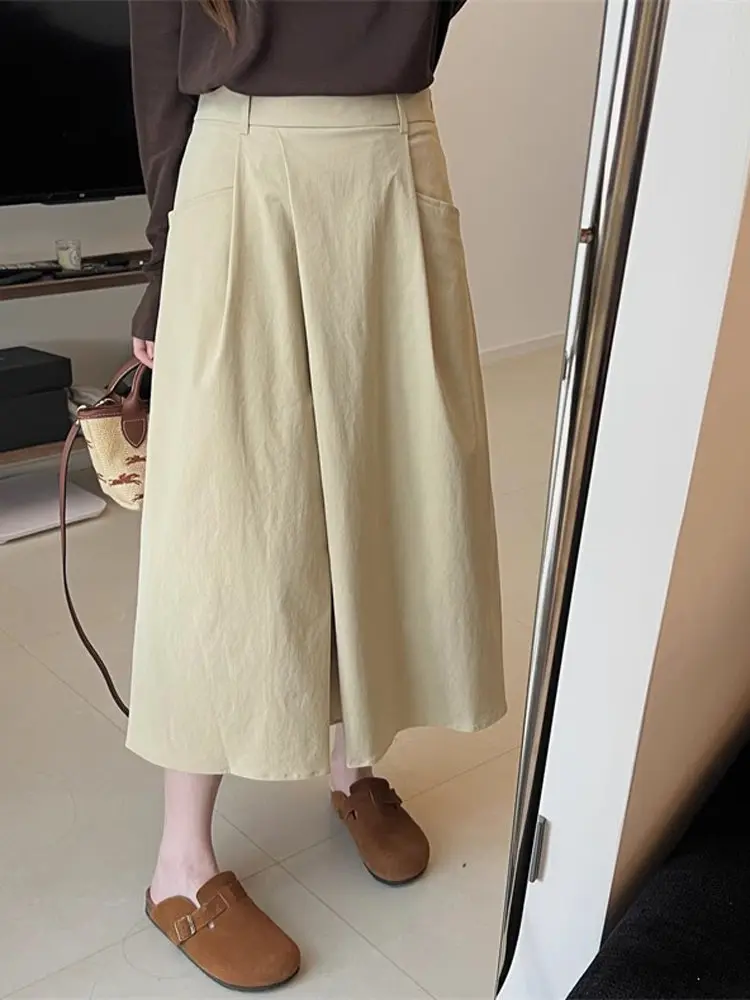

Slimming Loose Women's Midi Skirt Japanese Sle mat Pleated A-Line High Waist Summer 2025 Faion Versatile ket De...