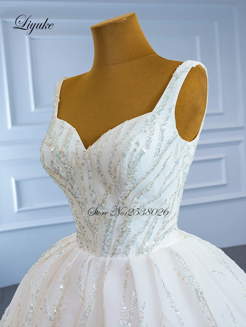 Liyuke مخصص الحبيب السباغيتي الأشرطة الكرة ثوب الزفاف من يزين مذهل الدانتيل التنانير الزفاف