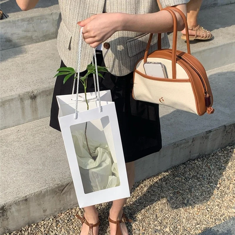 

2024, новая маленькая бостонская контрастная цветная лоскутная кожаная парусиновая сумка, весна-лето, женская сумка с мягкой ручкой