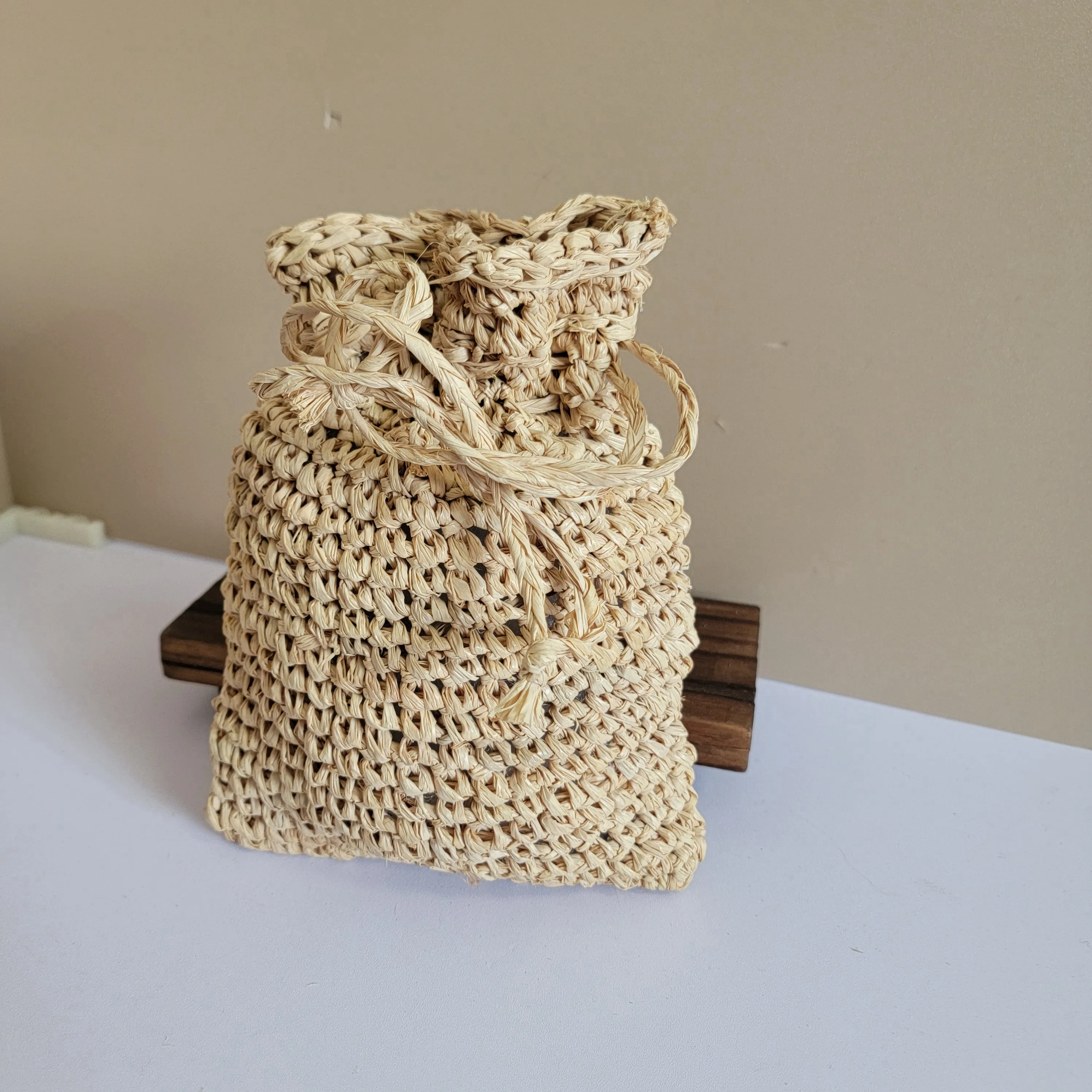 Picture 5: RAFFIA storage bag- drawstring bag