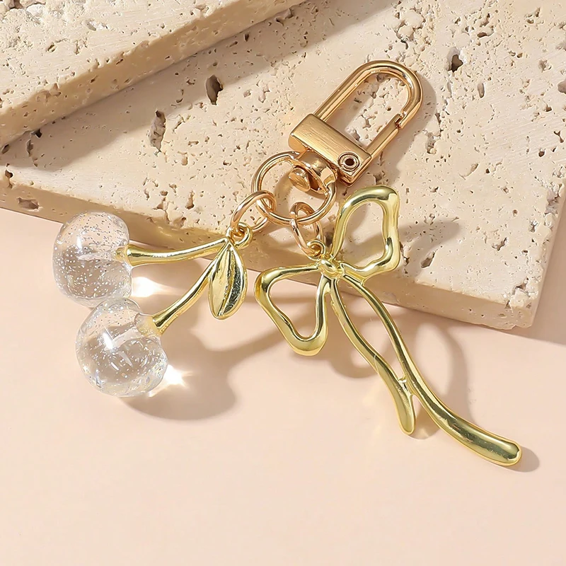 سلسلة مفاتيح على شكل كرز أحمر للنساء حقيبة لطيفة تزيين مجوهرات متعددة الوظائف ملحقات مفاتيح السيارة حلقة مفاتيح ساحرة عصرية