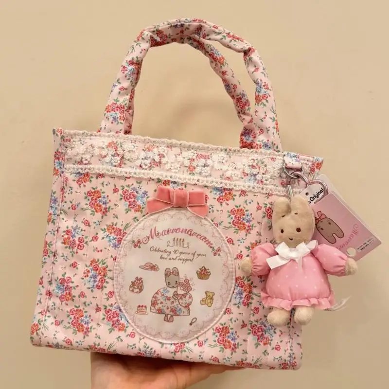 Kawaii Blumenmuster, braune Creme-Farbe, Tragetasche, neues japanisches Cartoon-Anime-Design mit Hasenmotiv, große Kapazität, Handtasche, Aufbewahrungstasche, Geburtstagsgeschenk für Freunde.