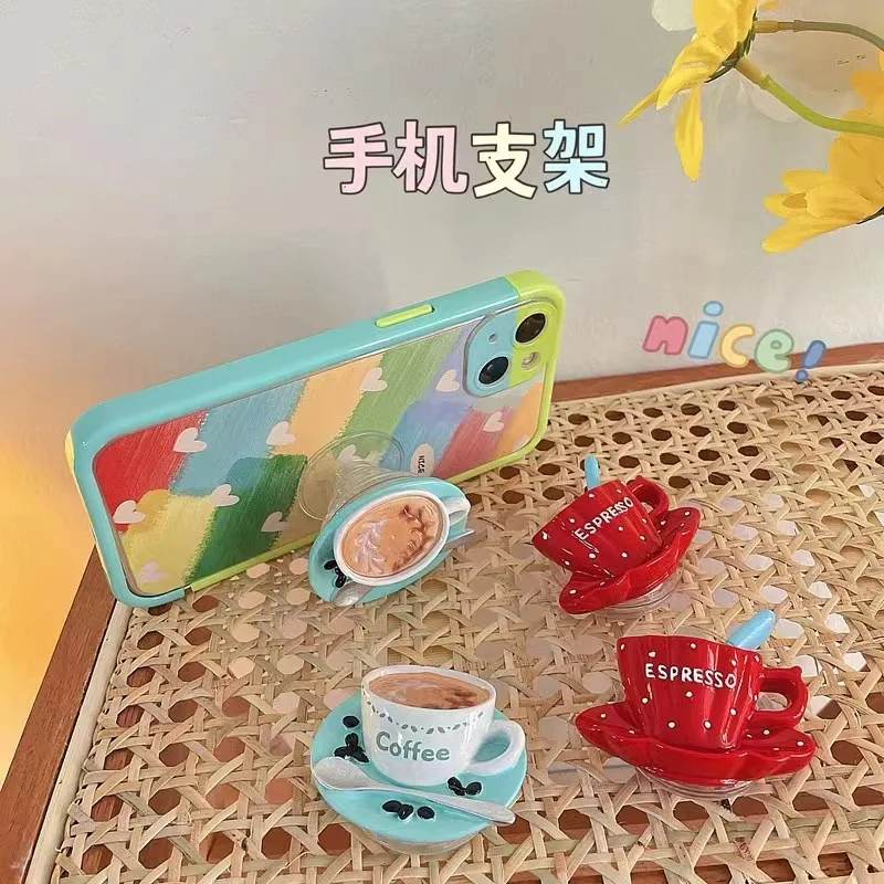 コーヒークッション電話ホルダー インニッチスタイル シンプルな漫画電話ケース 伸縮式クッションリングバックル 粘着タイプ