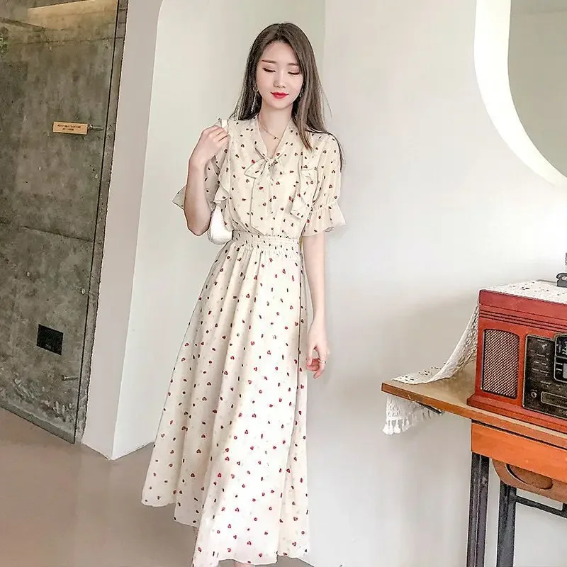 ชุดเดรสลายดอกไม้เอวอ่อนโยนในฤดูร้อนกระโปรงยาวทรงสลิมอารมณ์เล็ก