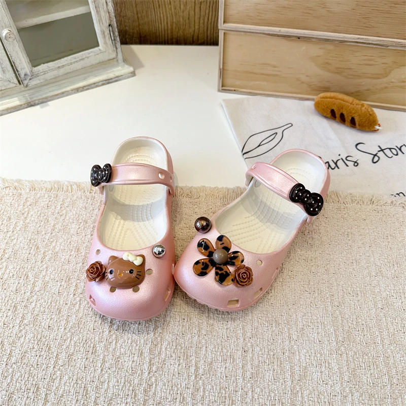A pair of children's mary jane toe-cap hollow sandals, adjustable strap cute slides for indoor and outdoor daily use TX-9210-72