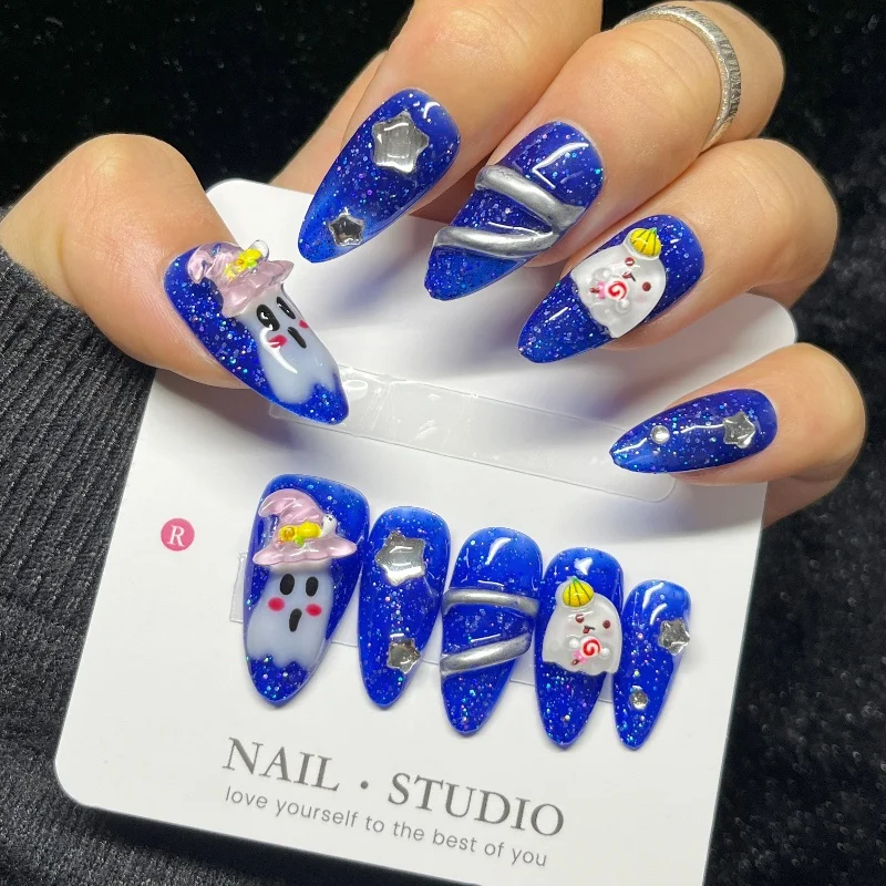 

10PCS Cute Halloween Press on Nails Almond Shape Blue Glitter Ghost Star Charms Glow in The Dark Fake Nails for Party Daily Wear