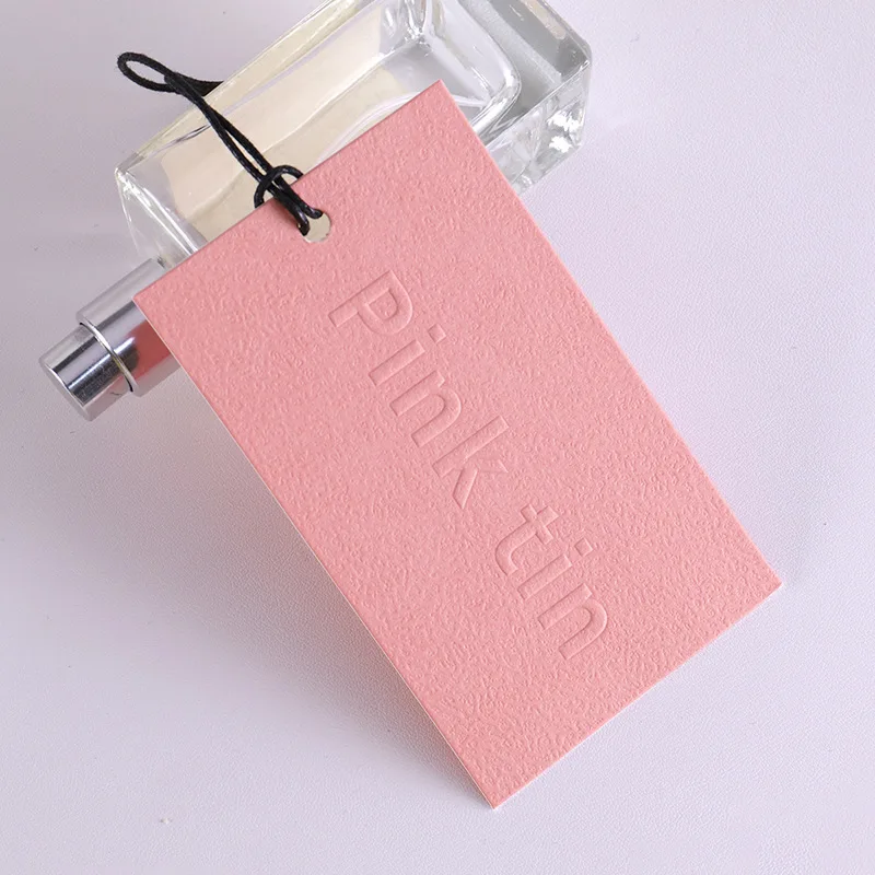 Custom 800Gsm Pink Cotton Texture Milan Pattern Embossed Hang Tag for Clothing Garment Label Wholesale