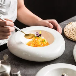 High-end hotel restaurant ceramic insulation plate white irregular position on the western food cold dish plate.