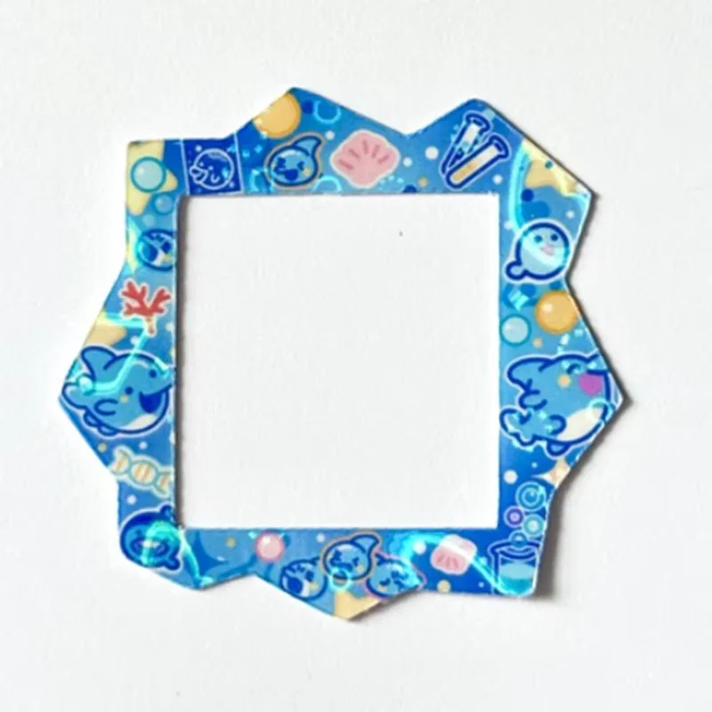 2025 ใหม่ทามาก็อตจิ พาราไดซ์ แฮปปี้ พาร์คสามารถครอบคลุมด้วยแผงกระดาษของเล่นในสต็อกของขวัญสำหรับเด็กชายและเด็กหญิง