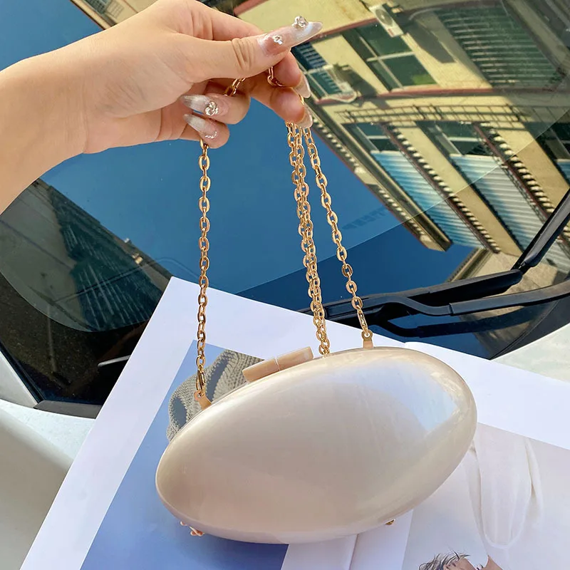 

Stylish high-quality textured acrylic bag, oval shell flowing color dinner bag, goose egg clutch bag