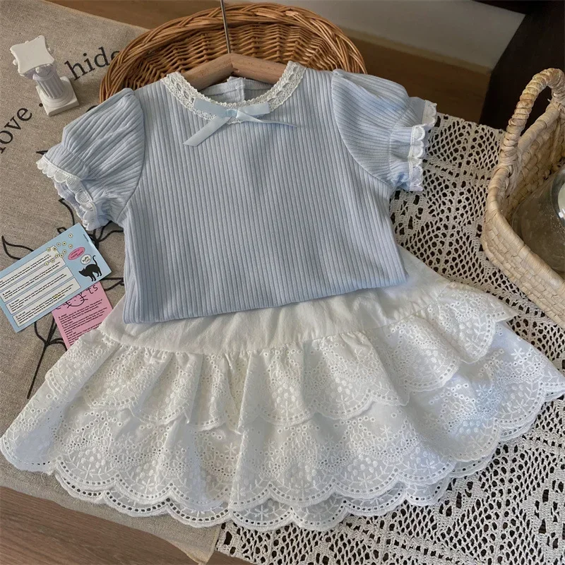 Abbigliamento per bambini Gonna di pizzo coreana Set di due pezzi di moda 2025 Nuova maglietta con maniche a palloncino per ragazze estive e set di