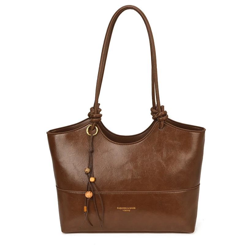 

Модная дизайнерская винтажная сумка для подгузников для женщин: элегантная минималистичная кожаная сумка через плечо, роскошная классическая сумка-тоут.