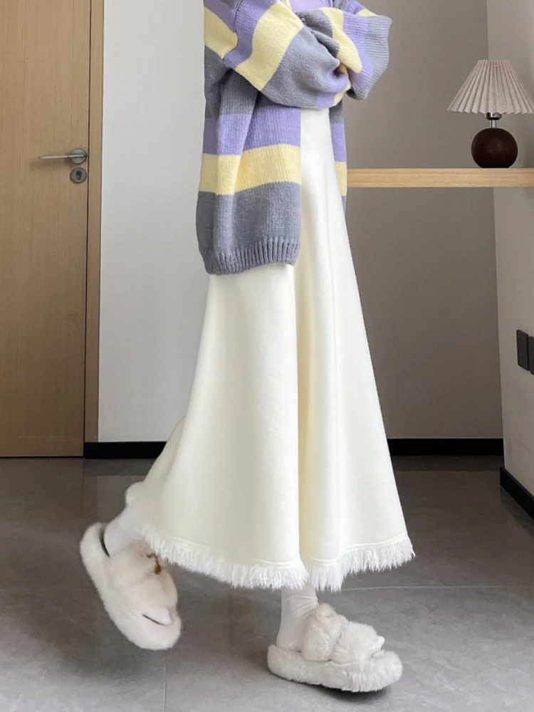 

Белая вязаная юбка-трапеция средней длины с бахромой, женская, осенне-зимняя, с высокой талией, утягивающая, фасон «зонтик»