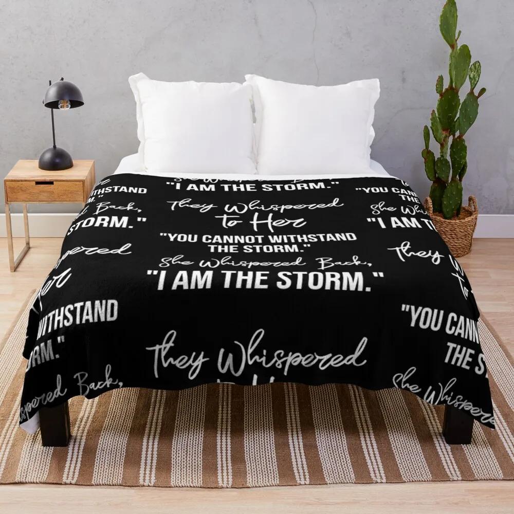 They Whispered To Her, You Cannot Withstand The Storm. She Whispered Back, I Am The Storm [White Text Inspirationa Throw Blanket